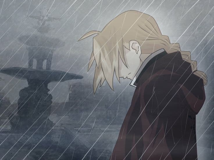 Ảnh khóc thầm dưới mưa của chàng trai