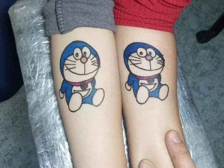 Tattoo Doraemon cặp ở tay