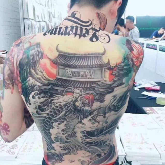 Tattoo cá chép hóa rồng vượt vũ môn quan