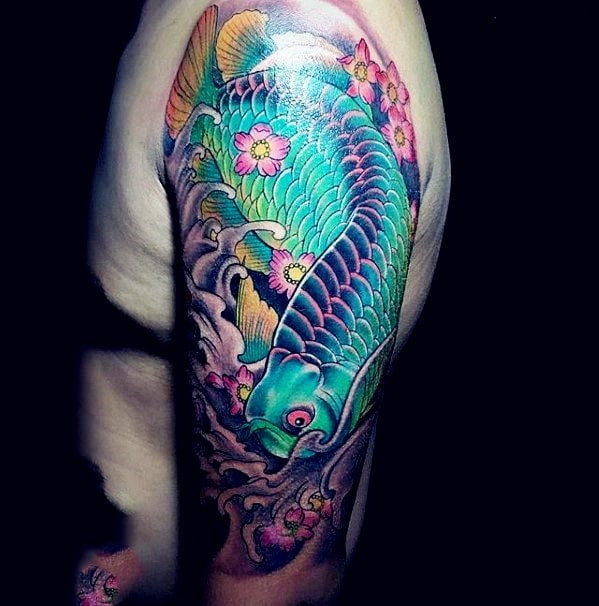 Tattoo cá chép rồng xăm ở bắp tay
