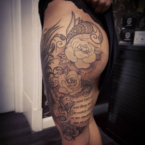 Tattoo hoa hồng ở đùi con gái