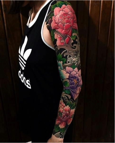 Tattoo hoa mẫu đơn có màu xăm bít tay