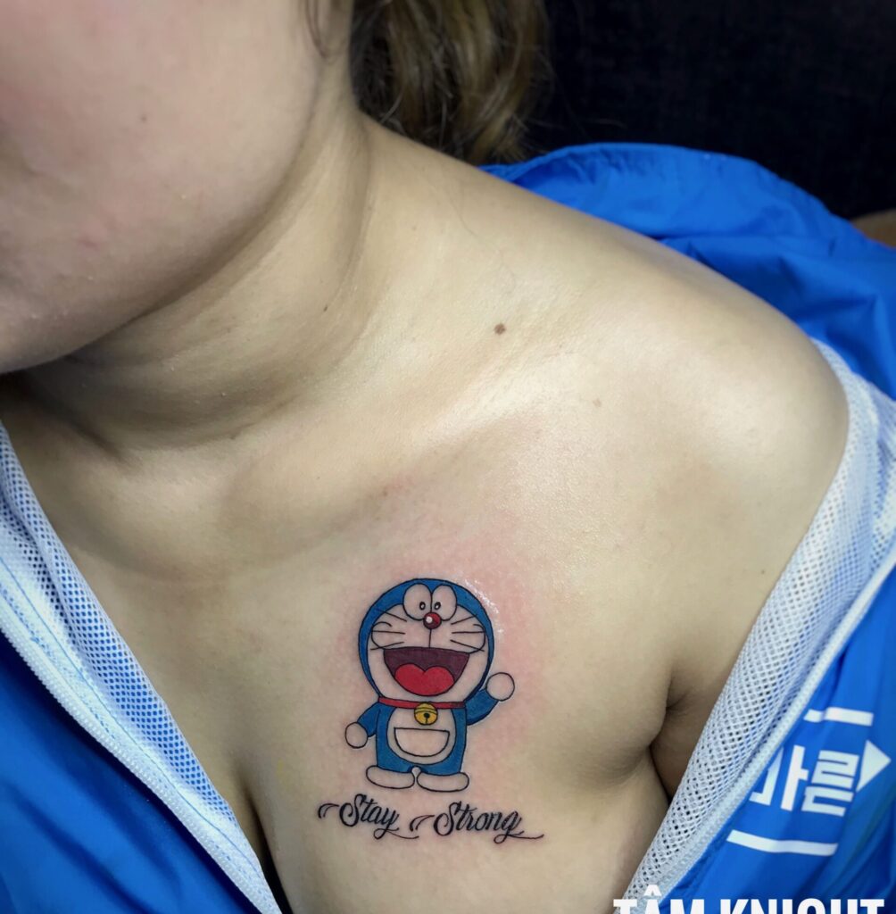 Tattoo xăm Doraemon mini ở ngực