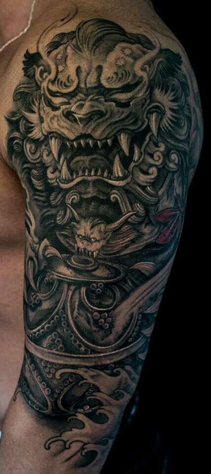 Tattoo xăm kỳ lân ở bắp tay ấn tượng