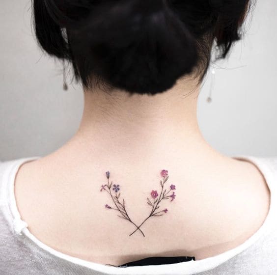 ảnh tattoo hình hoa lá mini sau gáy