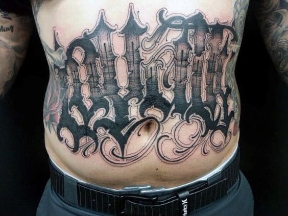 hình tattoo chữ ngầu trên bụng nam