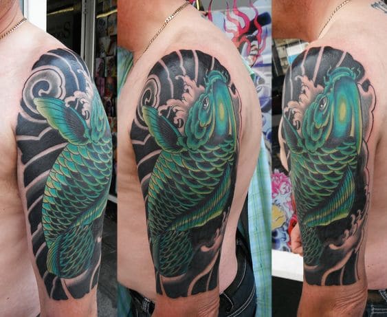mẫu tattoo cá chép ở tay màu xanh tuyệt đẹp
