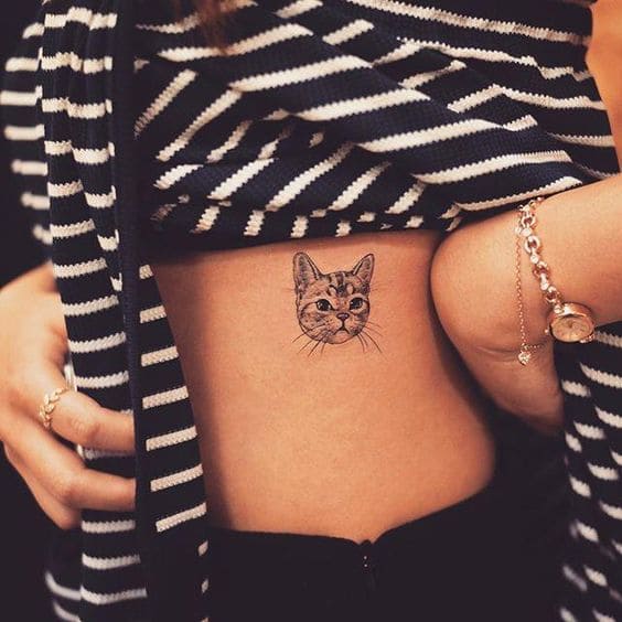 mẫu tattoo đầu con mèo ở bụng nữ đẹp
