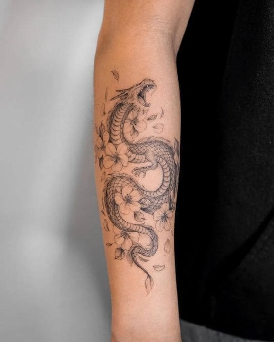 mẫu tattoo rồng ở cánh tay cho nữ