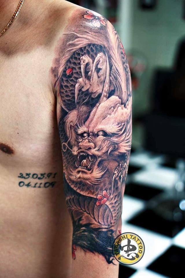 tattoo hình đầu rồng ở bắp tay nam cực đẹp