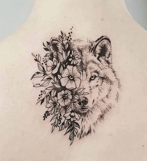 Hình tattoo chó sói và hoa cá tính cho nữ