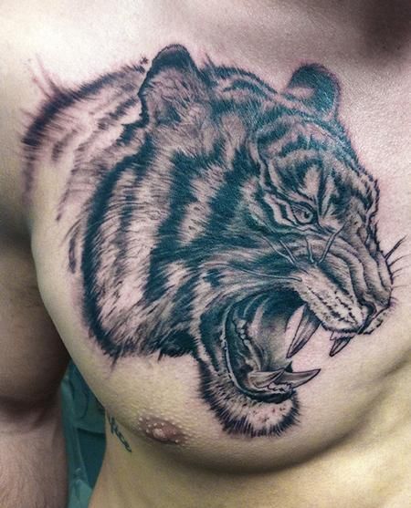 Hình tattoo hổ bên trên ngực phái nam đẹp mắt nhất