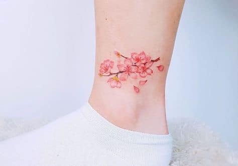 Hình tattoo hoa đào ở chân đẹp