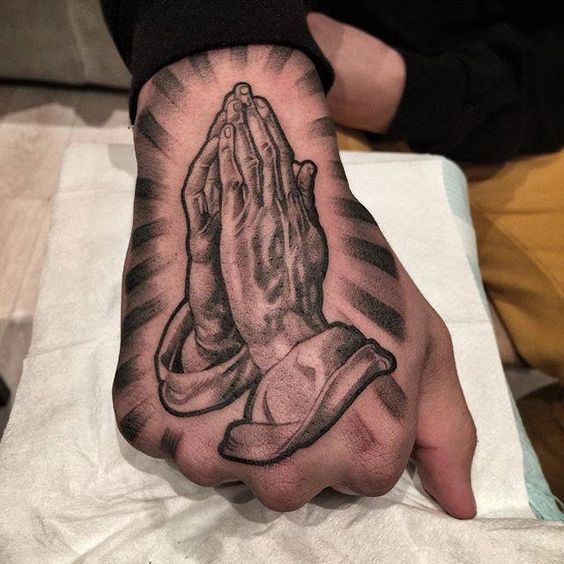 Mẫu tattoo đôi bàn tay phật ở tay